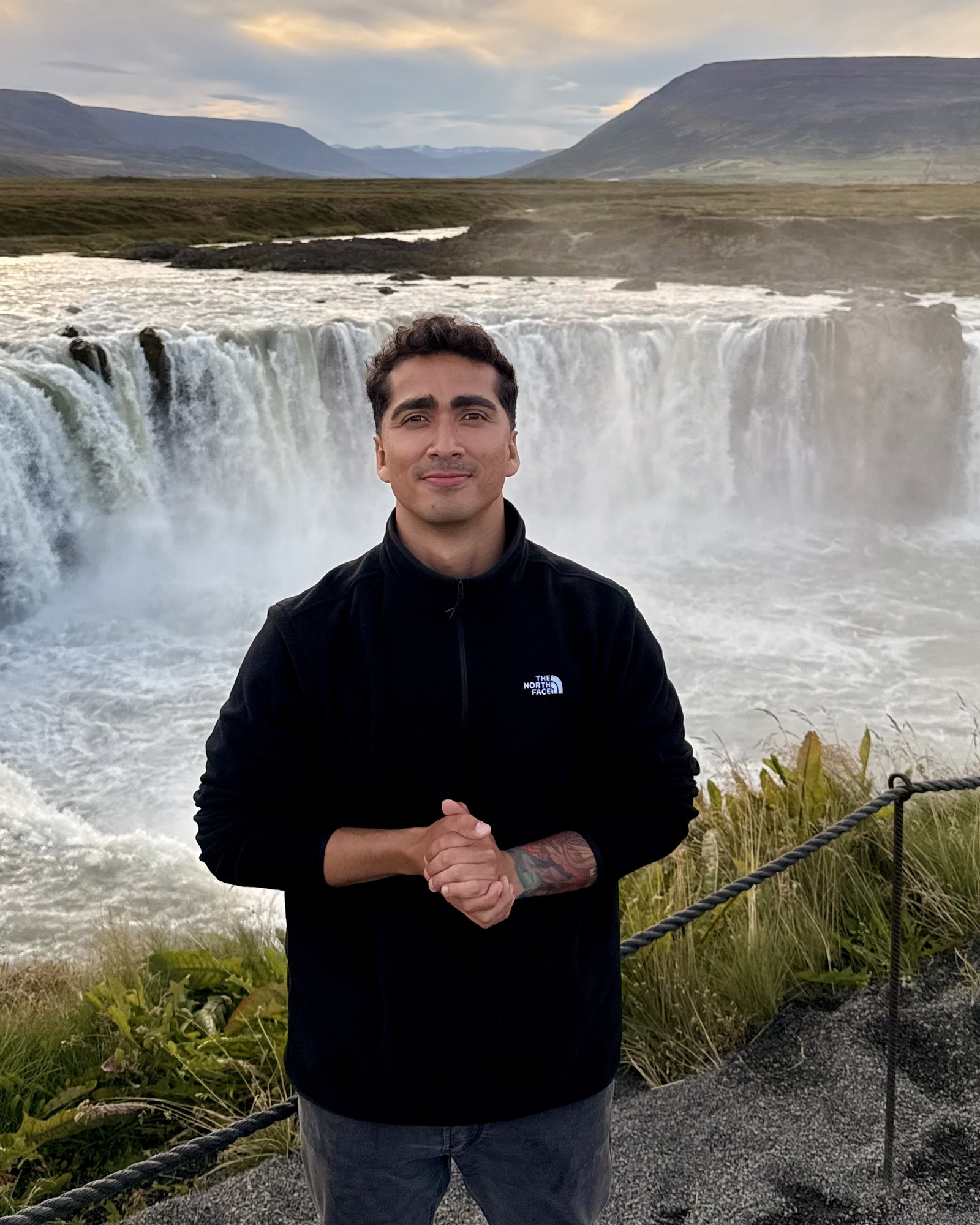 Founder of Morpho, standing in front of Goðafoss waterfall in Iceland